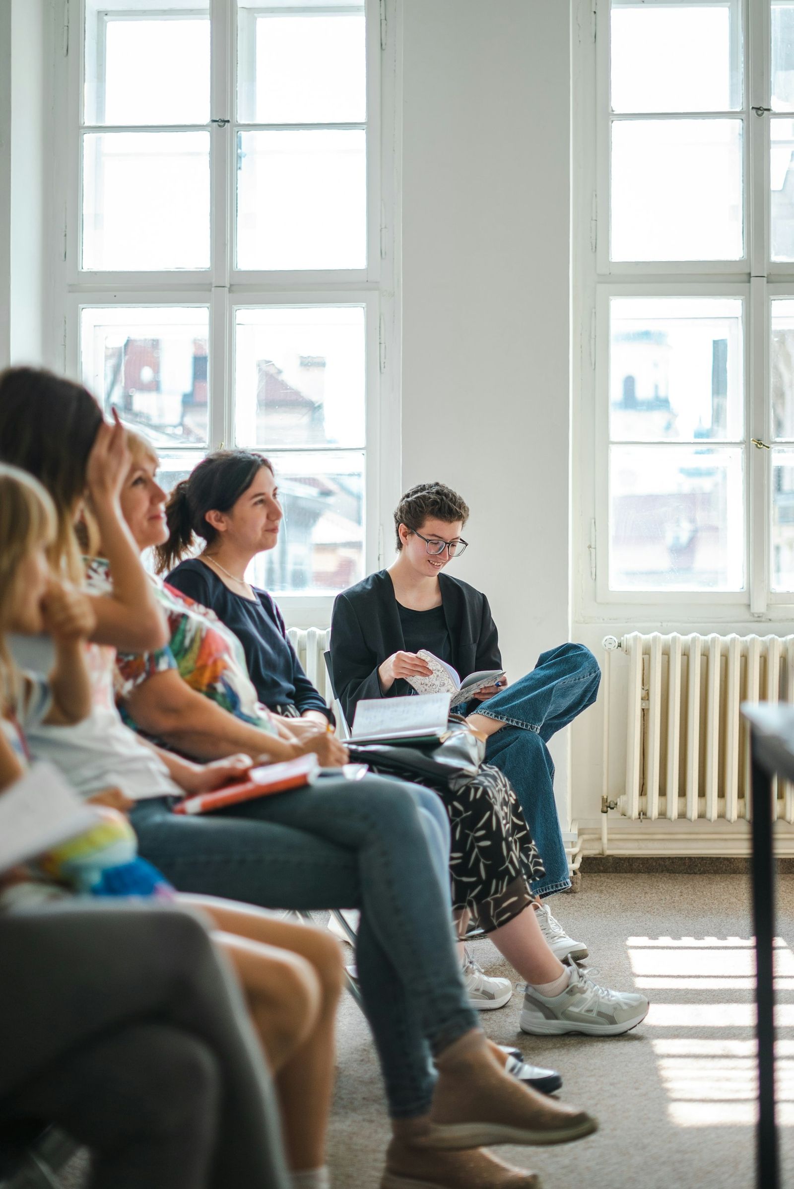 A small group session in a bright room