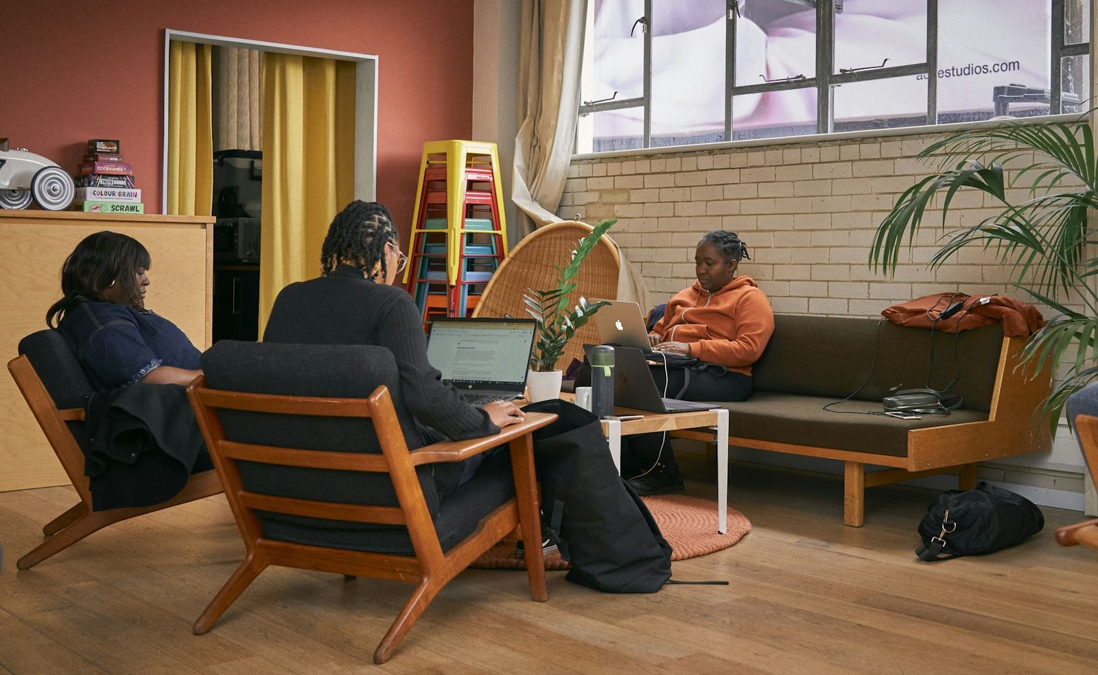 Residents and staff in a shared living room